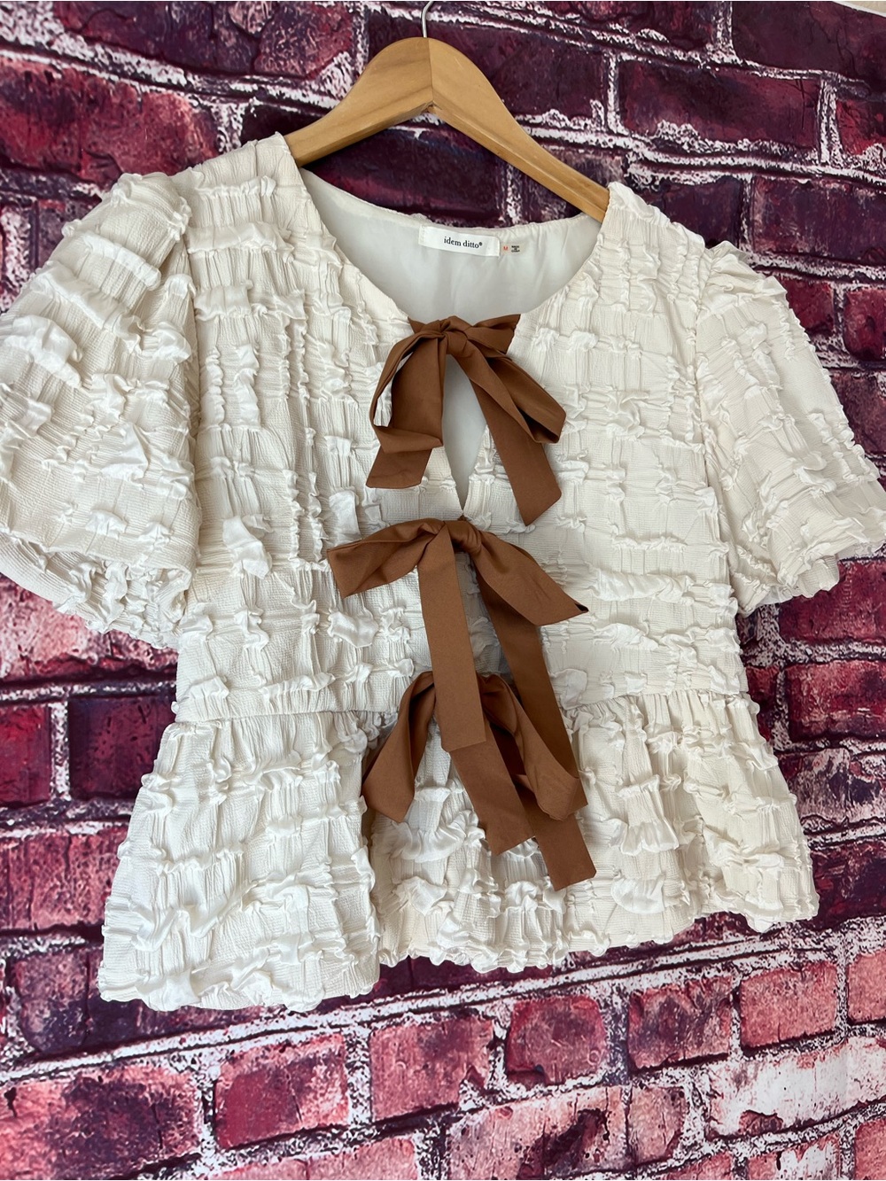 Idem Ditto Cream Bubble Textured Tie-Front Bow Babydoll Peplum Blouse - Picture 4 of 6